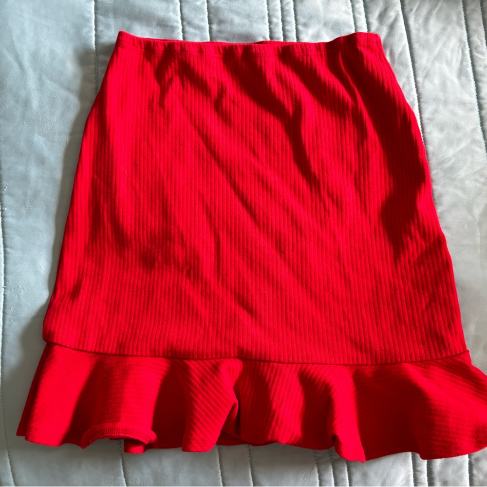 Red peplum mini skirt. Worn once.